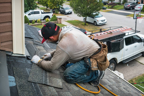 Professional Roofing technician working in Mecca, IN
